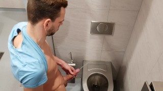 Pee with a hard boner on a public toilet! get hidden , caught
